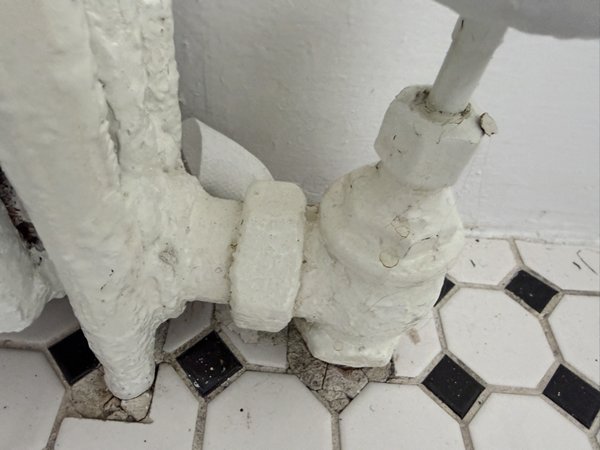 Lead encapsulated radiator valve potential exposure hazard