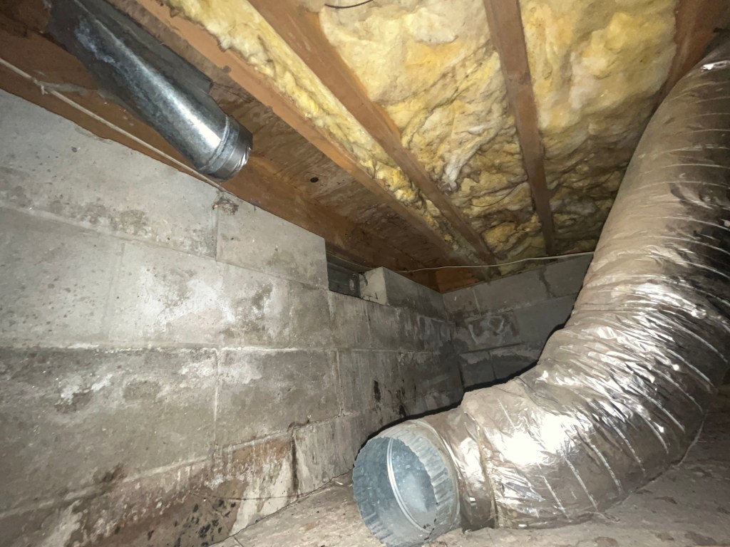 HVAC ductwork and insulation damaged by prolonged moisture exposure in crawlspace
