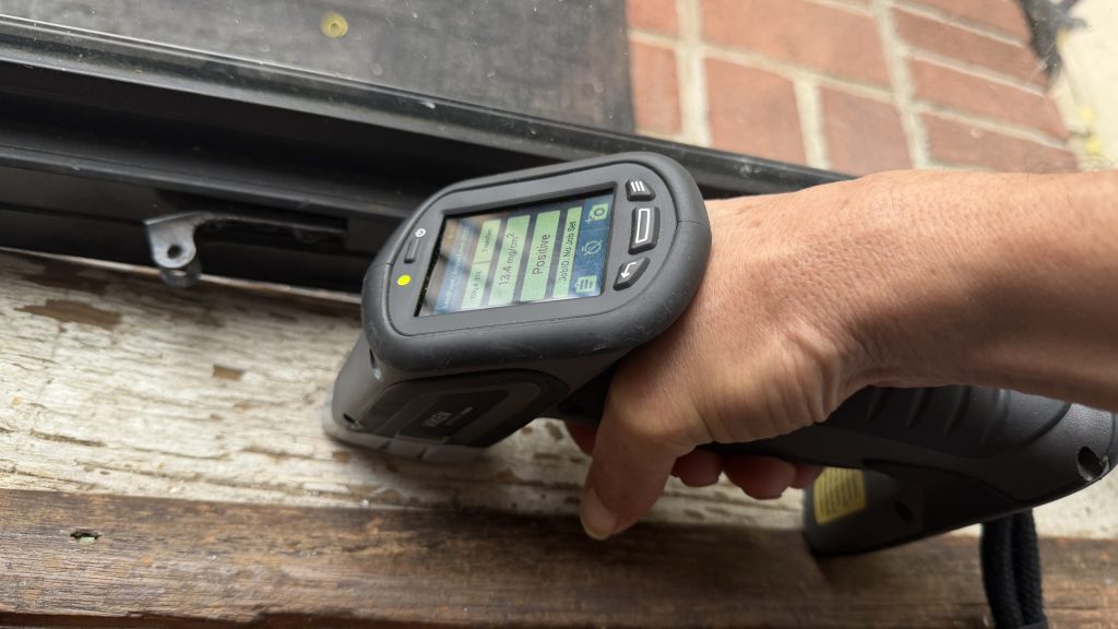 XRF lead paint testing on door threshold Philadelphia rental property